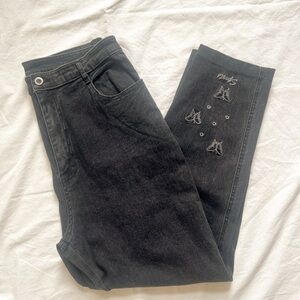 Black Straight Leg Jeans with Worn-In Texture